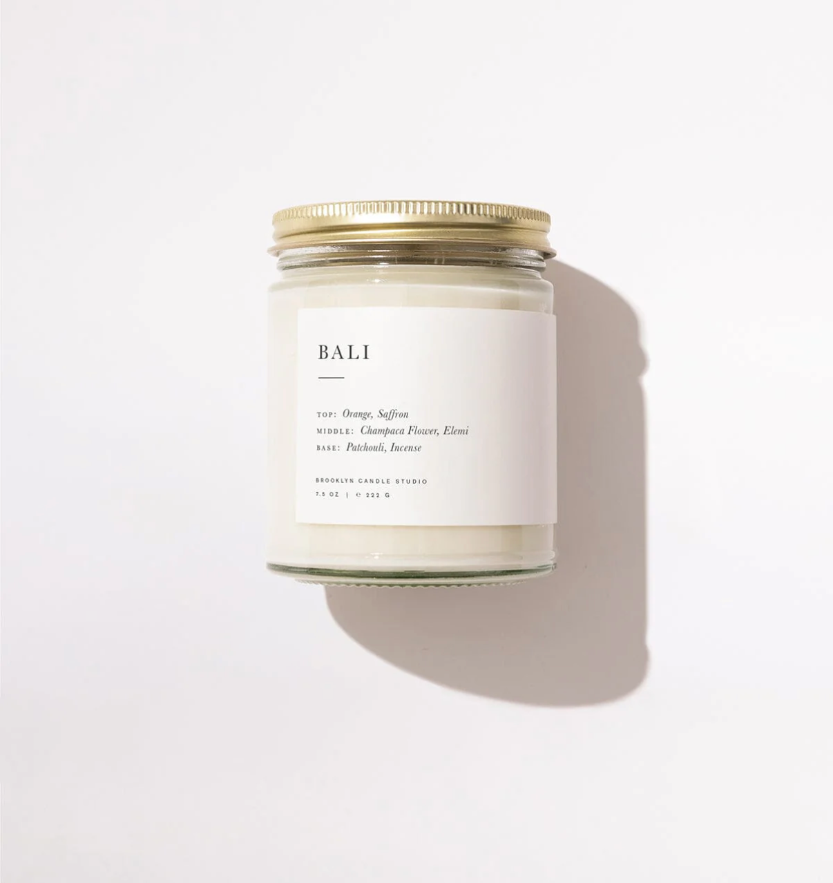 Candle jar labeled 'Bali' on a white background
