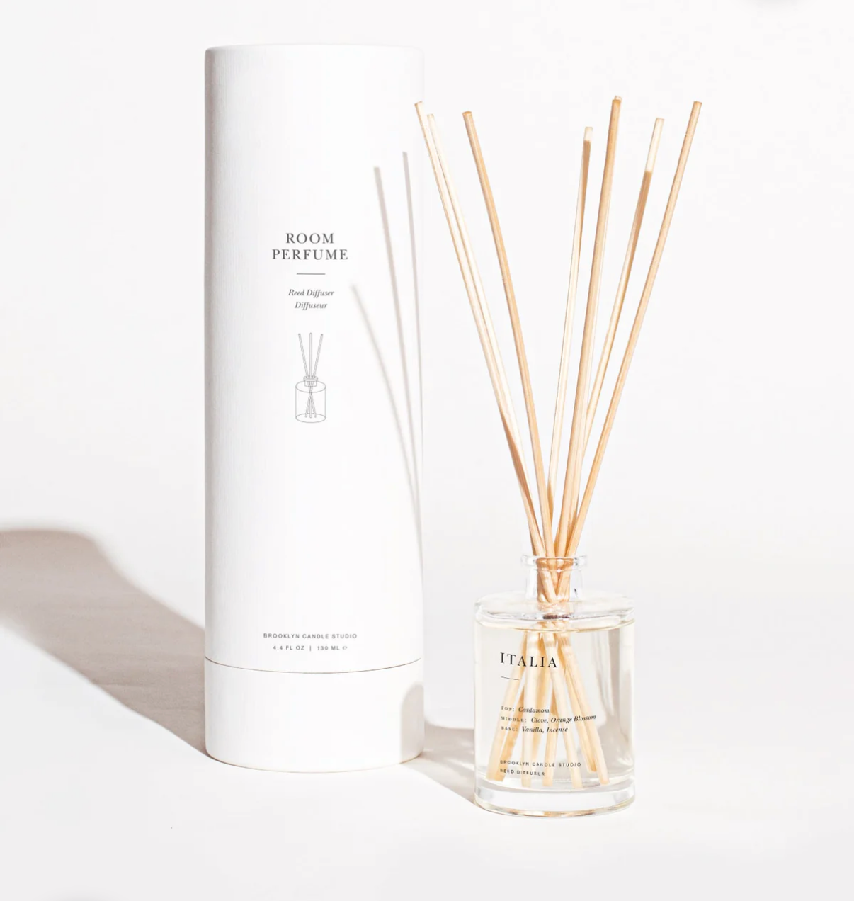 Room perfume diffuser with packaging on a white background