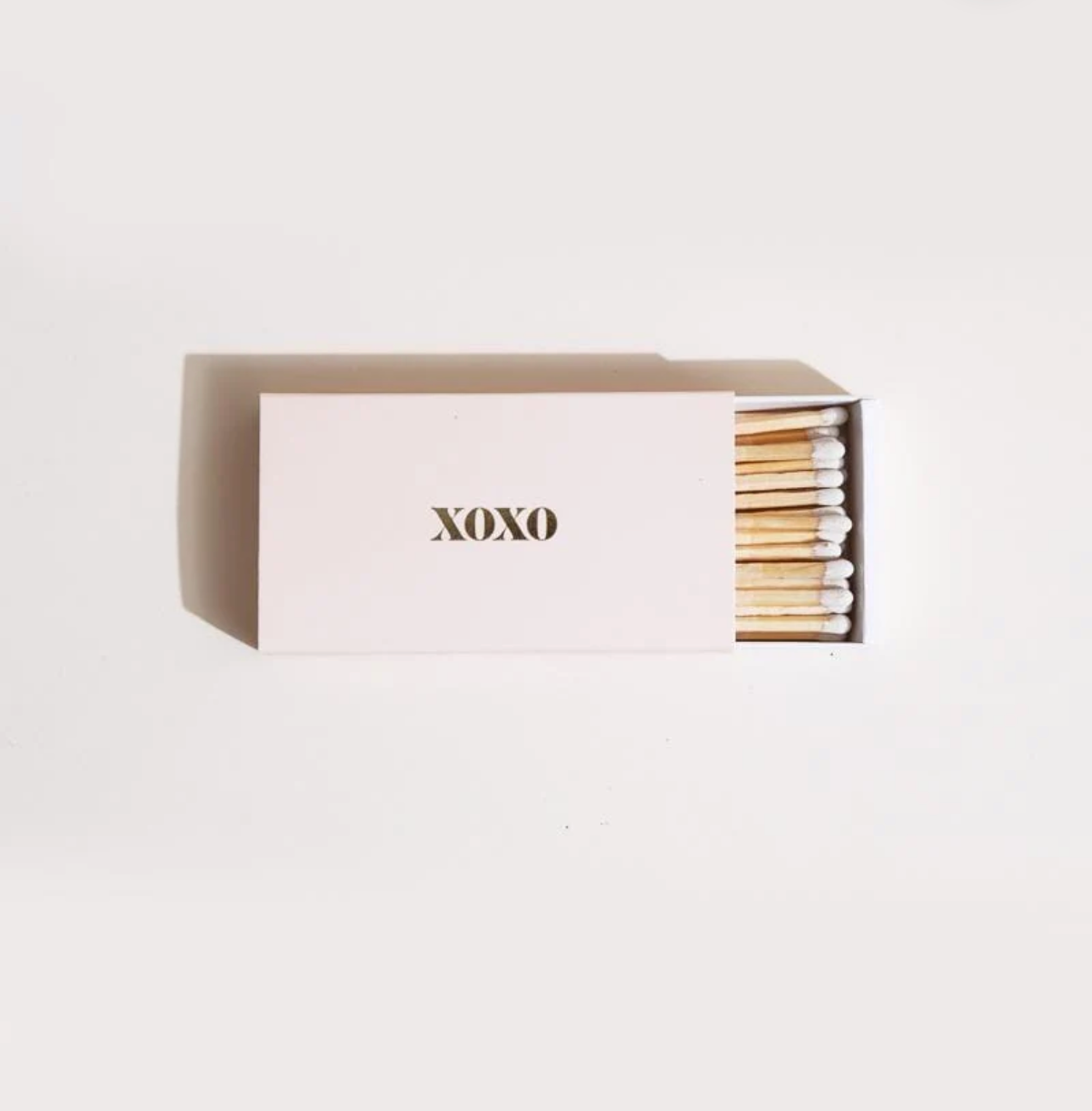 Matches with 'XOXO' text on a white background