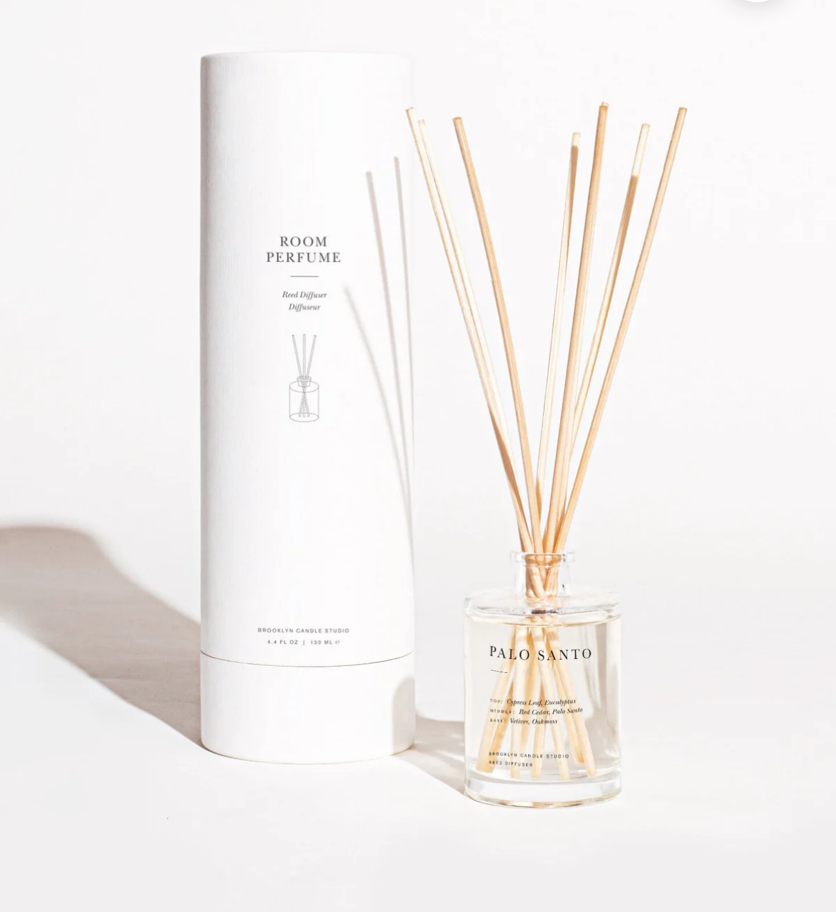 Room perfume with Palo Santo sticks on a white background